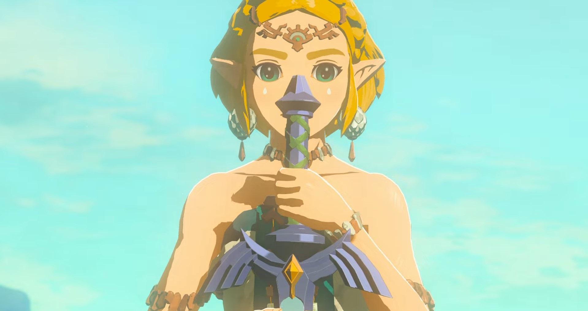 'Lágrimas del Reino' Zelda sosteniendo una Espada Maestra dañada.