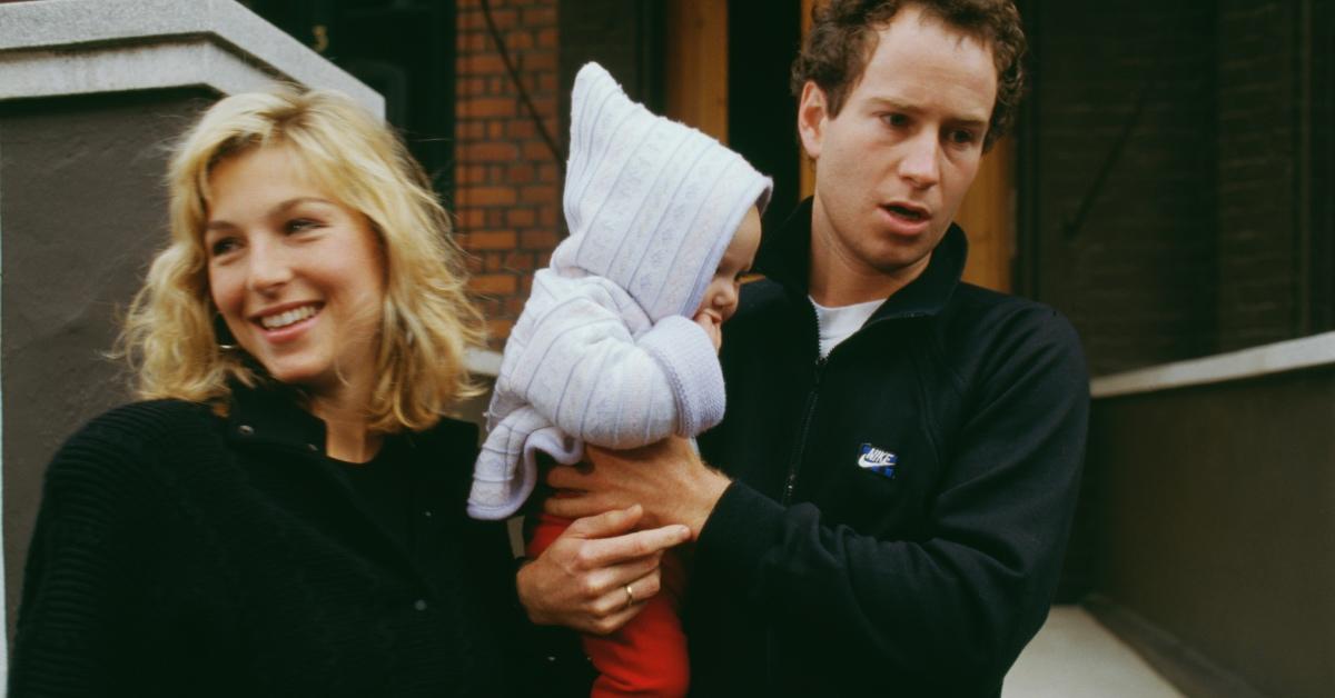 John McEnroe with his first wife, Tatum O'Neal, and one of their children.