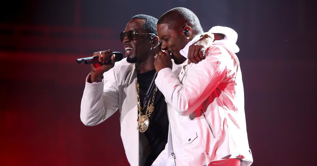 Recording artists Puff Daddy (L) and Mase look happy while they perform on stage during the Live Nation presents Bad Boy Family Reunion Tour in 2016.
