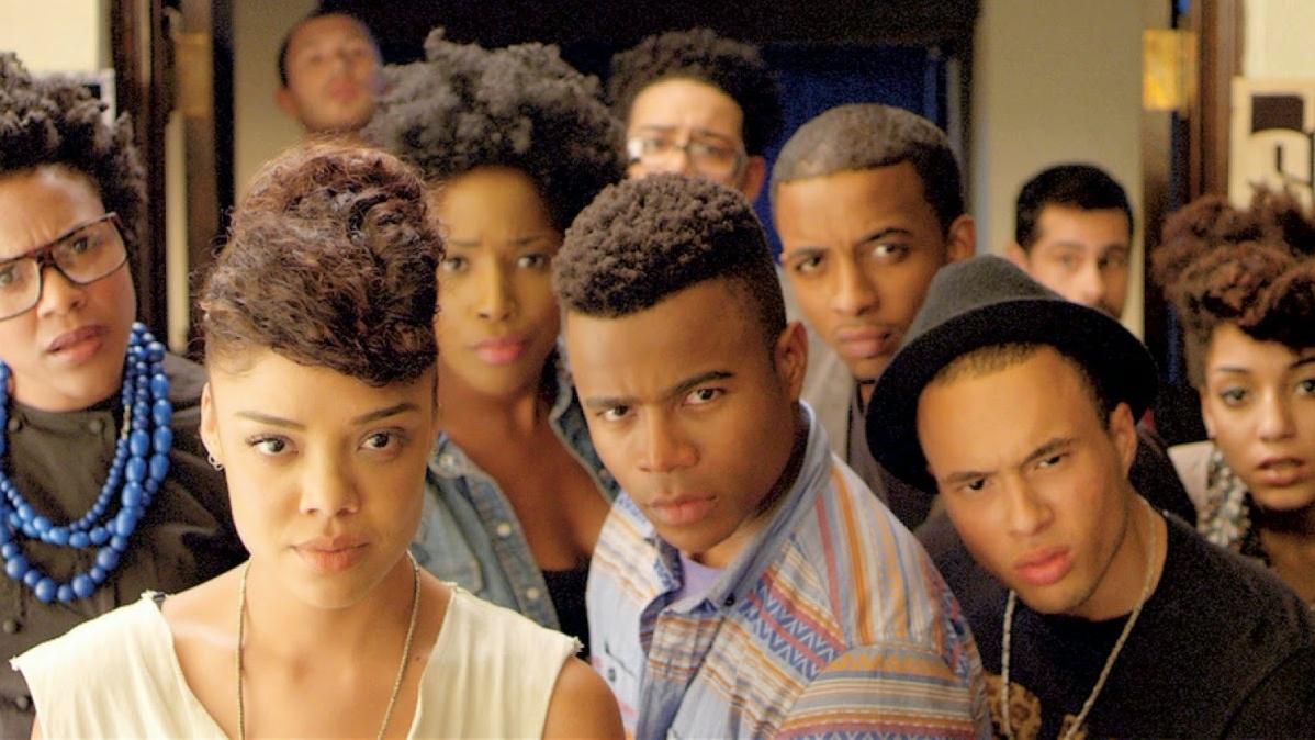 Scene from 'Dear White People' where a group of Black people stare into the camera with an attitude.