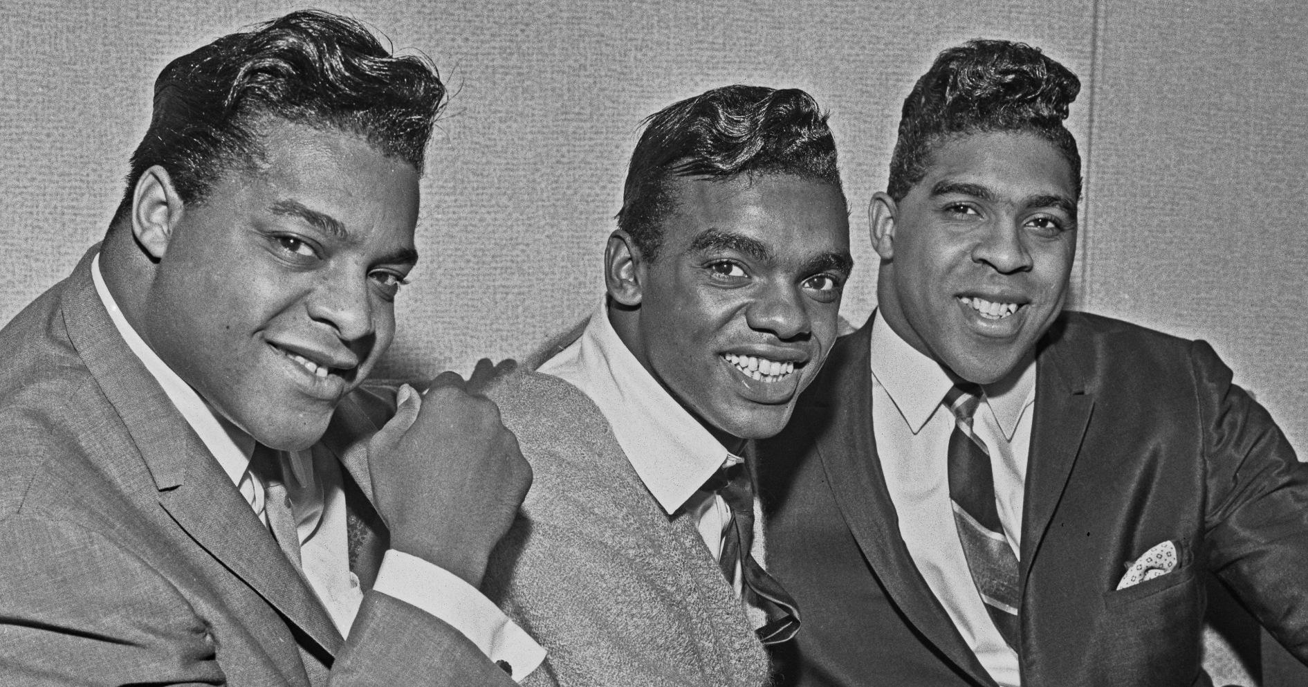 American vocal trio the Isley Brothers, UK, 24th October 1964. From left to right, they are brothers O'Kelly Isley Jr., Ronald Isley and Rudolph Isley. 