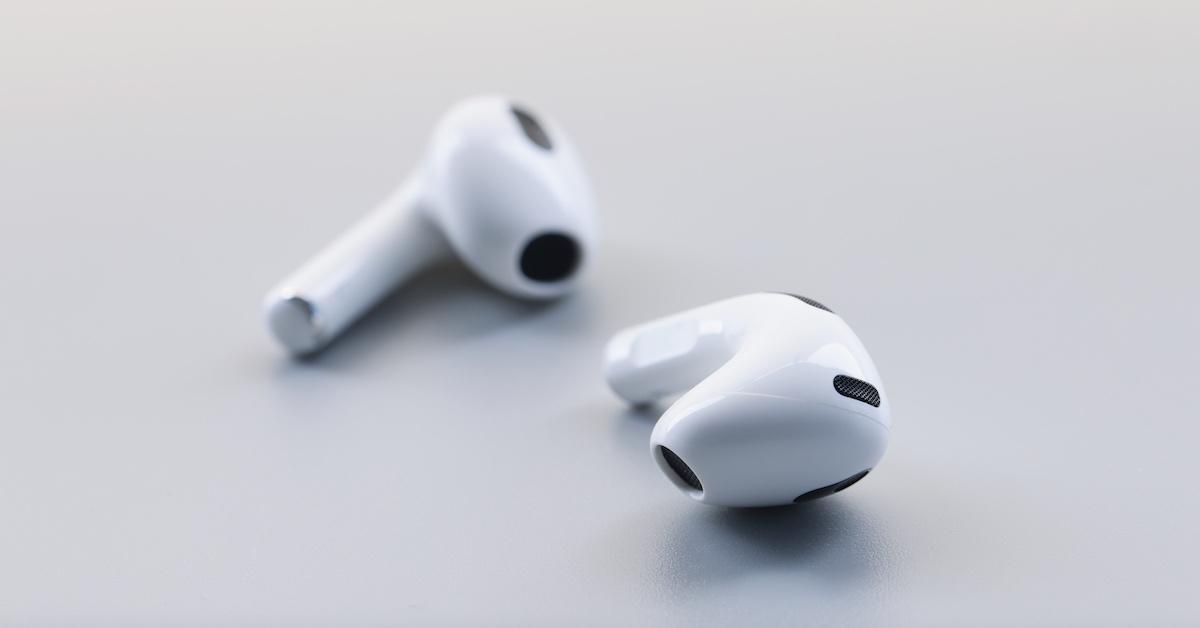 A pair of AirPods on a table