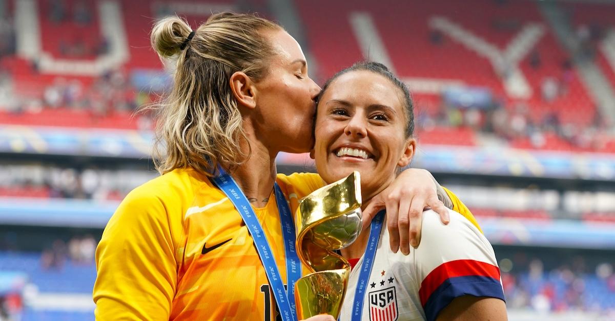 Ashlyn Harris and Ali Krieger after winning the World Cup